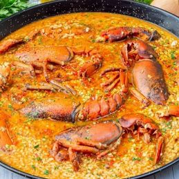 Especialidad de arroz con bogavante en el restaurante El Laurel